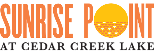 Logo for Sunrise Point at Cedar Creek Lake featuring stylized text and a graphic sun.