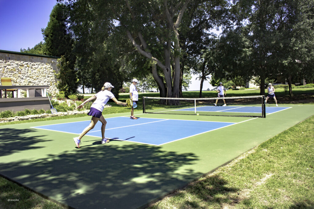 Guests playing lakeside pickleball